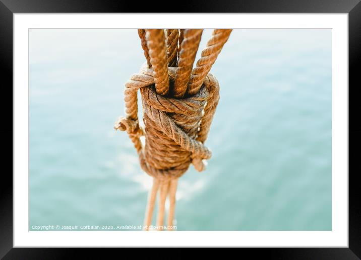 Rigging and ropes on an old sailing ship to sail in summer. Framed Mounted Print by Joaquin Corbalan