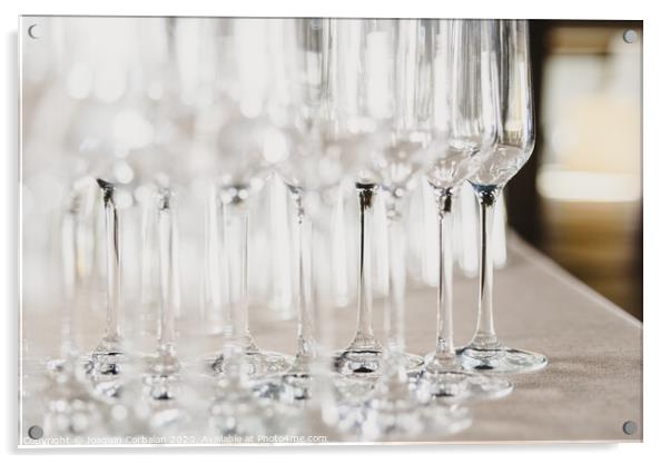 Group of empty and transparent champagne glasses in a restaurant.Group of empty and transparent champagne glasses in a restaurant. Acrylic by Joaquin Corbalan