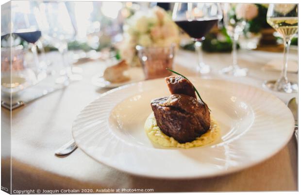 Meat dish served elegantly in a luxurious wedding in an event restaurant. Canvas Print by Joaquin Corbalan