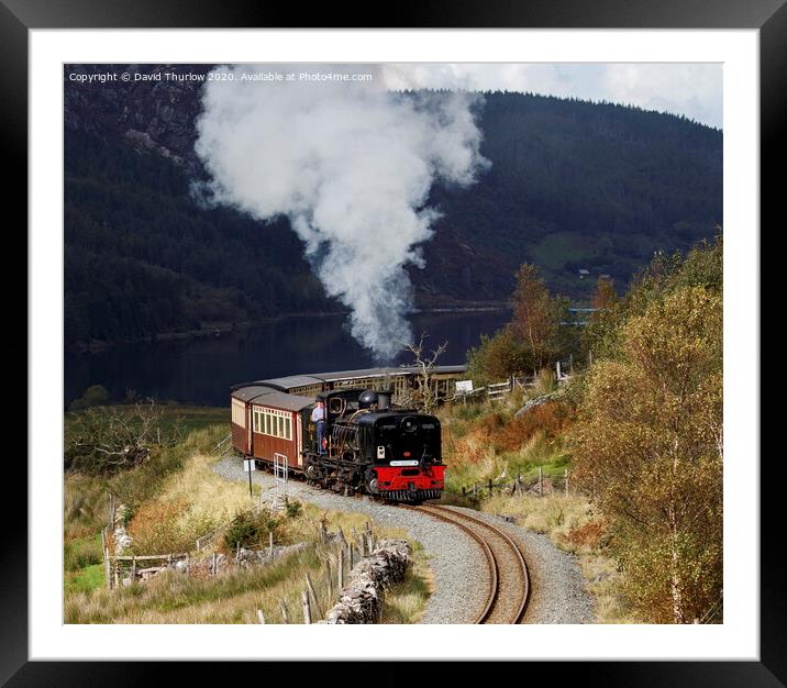 Welsh Highland Railway locomotive No87 winds its way to Rhyd Ddu. Framed Mounted Print by David Thurlow