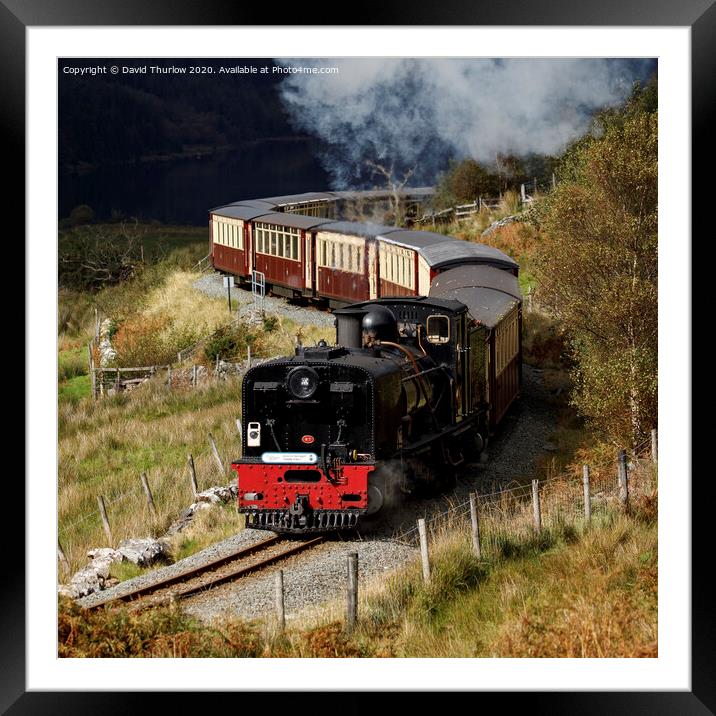 Welsh Highland Railway locomotive No87 winds its way to Rhyd Ddu. Framed Mounted Print by David Thurlow