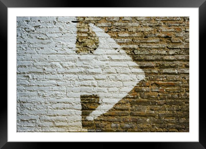 Brick wall with big white arrow indicating direction, background with copy space. Framed Mounted Print by Joaquin Corbalan