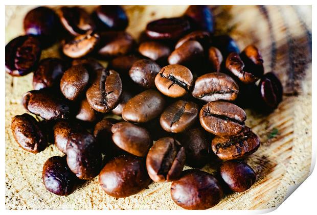 Detail of roasted coffee beans, produced in Colombia. Print by Joaquin Corbalan