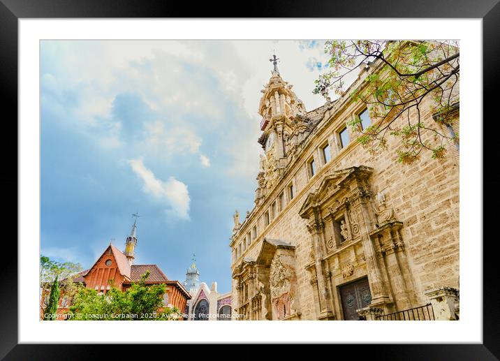 Turistic square Central Market of Valencia, near the Lonja de la Seda, view of the roofs of buildings one day with clouds in the sky. Framed Mounted Print by Joaquin Corbalan