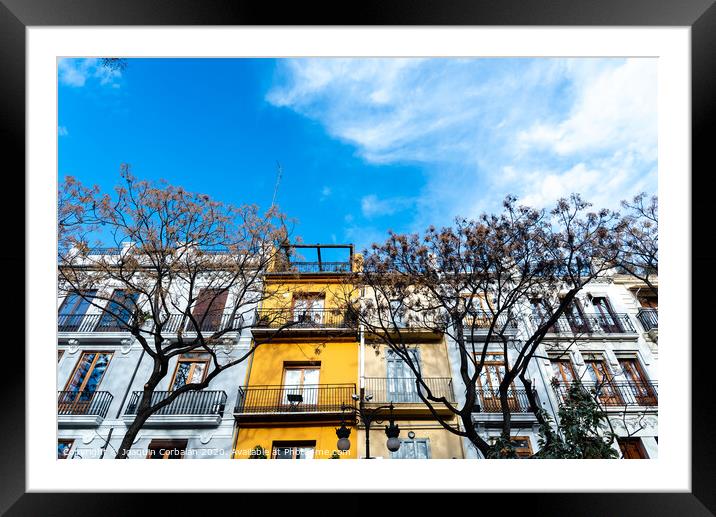 Detail of colorful facades of houses in María Cristina street, in the center of the tourist city of Valencia Framed Mounted Print by Joaquin Corbalan