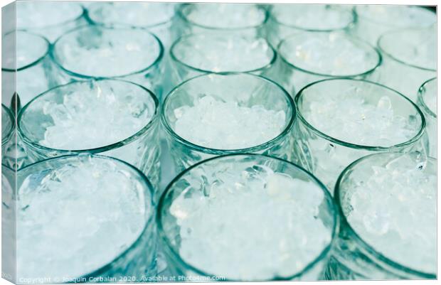 Pattern of glasses with ice ready to prepare a cocktail with refreshing background. Canvas Print by Joaquin Corbalan