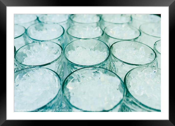 Pattern of glasses with ice ready to prepare a cocktail with refreshing background. Framed Mounted Print by Joaquin Corbalan