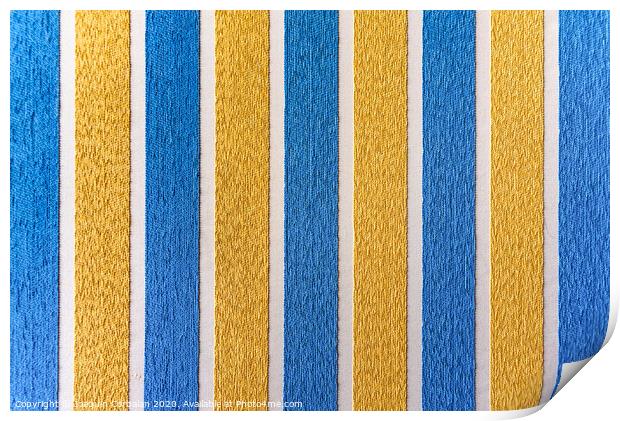 Strips of colored fabric cover a wall of carpet, decoration background. Print by Joaquin Corbalan