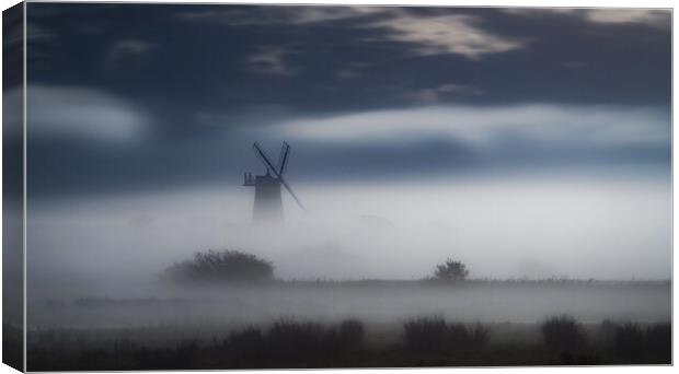 A misty moonlit Burnham Overy Staithe mill Canvas Print by Gary Pearson