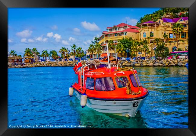 Orange Lifeboats Across Colorful Bay Framed Print by Darryl Brooks