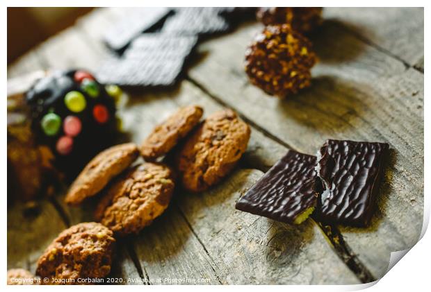 Chip cookies and chocolates pralines to take pleasure in Christmas holidays Print by Joaquin Corbalan