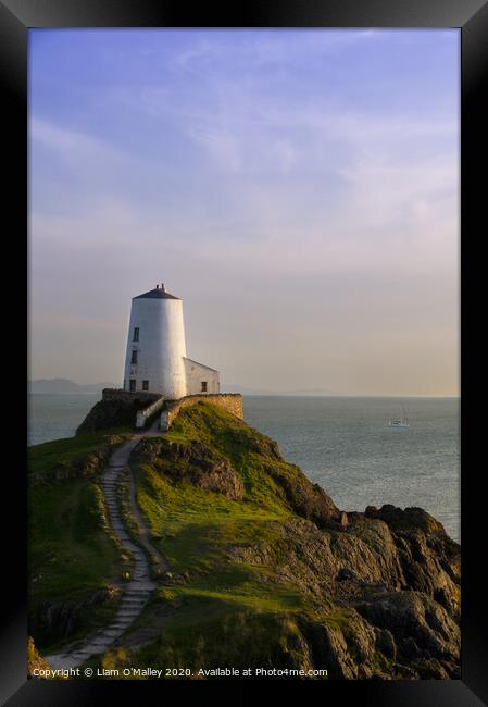 Sailing out to Sea from the Twr Mawr Lighthouse An Framed Print by Liam Neon
