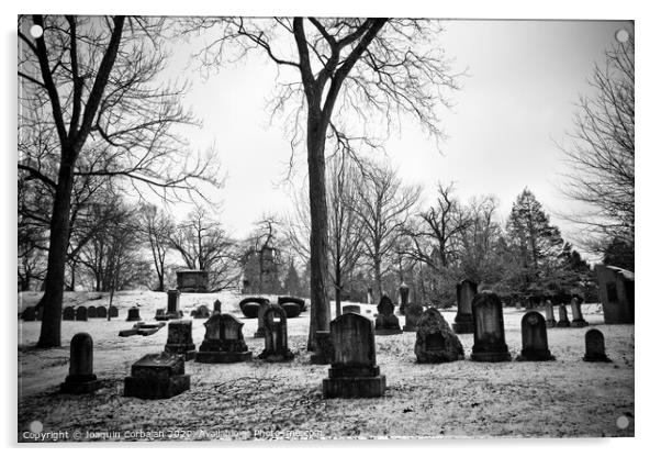 black and white snowy graveyard with aged tombstones Acrylic by Joaquin Corbalan