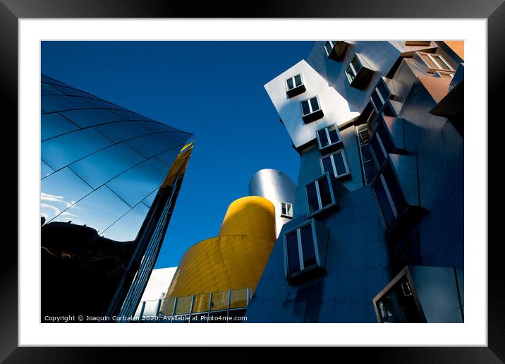 Large buildings with reflections of a big city in Boston, at MIT Framed Mounted Print by Joaquin Corbalan