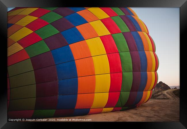 Colorful balloons flying over mountains and with blue sky Framed Print by Joaquin Corbalan