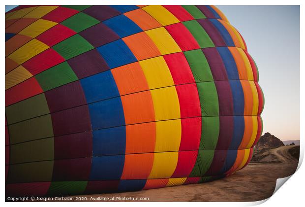 Colorful balloons flying over mountains and with blue sky Print by Joaquin Corbalan