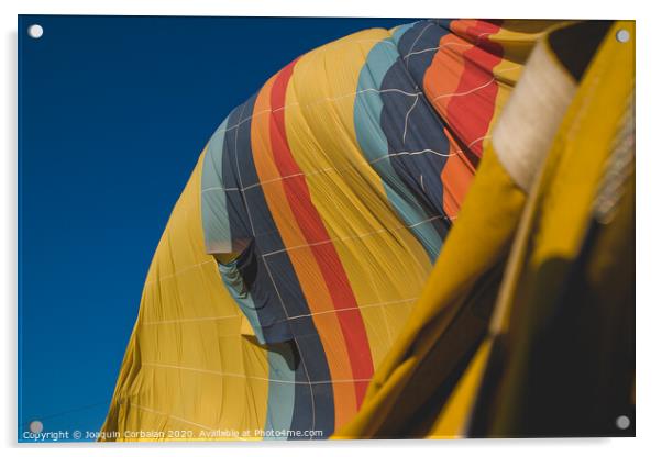 Colorful balloons flying over mountains and with blue sky Acrylic by Joaquin Corbalan
