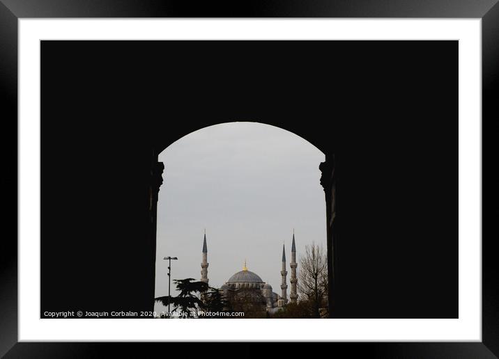minarets in the city for the prayer of the Muslim religion Framed Mounted Print by Joaquin Corbalan