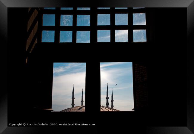 minarets in the city for the prayer of the Muslim religion Framed Print by Joaquin Corbalan