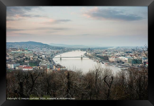 Sunset view of the city of Budapest on a cloudy day. Framed Print by Joaquin Corbalan