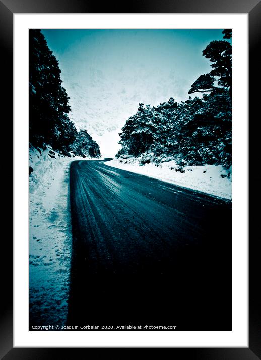 Lonely road in the countryside for a car trip and disconnect from stress Framed Mounted Print by Joaquin Corbalan