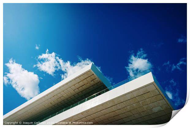 Blue sky background with clouds and a roof of modern financial business building. Print by Joaquin Corbalan
