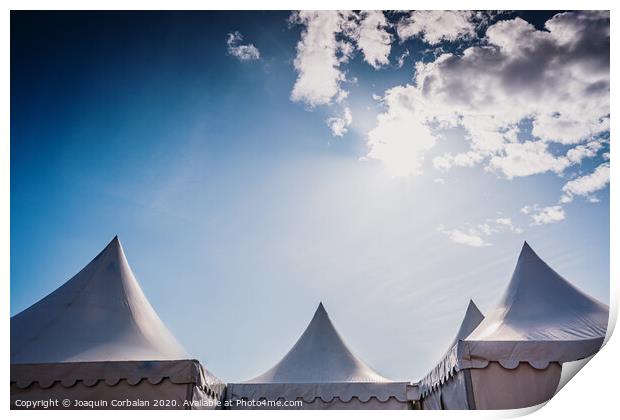 Peaks of three pyramidal white tents and blue sky background with space for advertisers text. Print by Joaquin Corbalan
