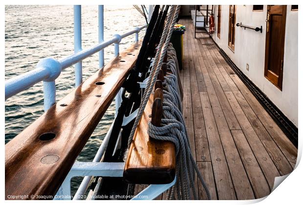 Beautiful  old sailboat anchored in the sea. Print by Joaquin Corbalan