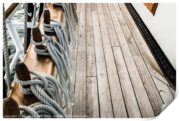 Ropes on a sailboat to tighten the sails of the ship during a cruise for tourists. Print by Joaquin Corbalan