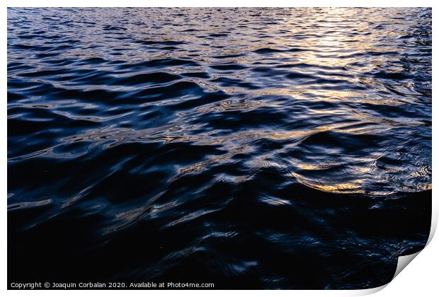 Waves on the surface of the sea water at dusk with compact, solid and deeply calm texture. Print by Joaquin Corbalan
