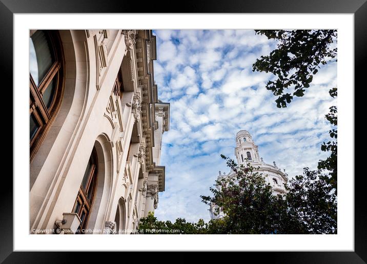 Facade of large institutional building with large columns and windows, background sky, low angle shot, in Valencia. Framed Mounted Print by Joaquin Corbalan