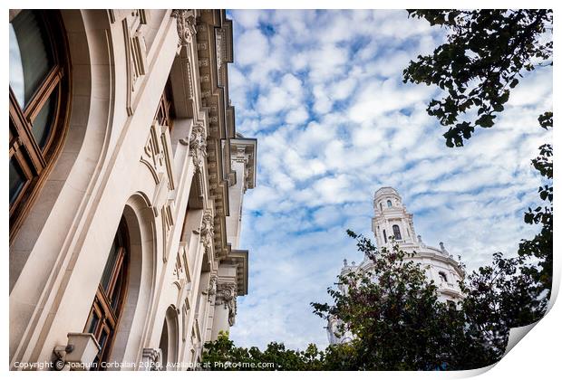 Facade of large institutional building with large columns and windows, background sky, low angle shot, in Valencia. Print by Joaquin Corbalan