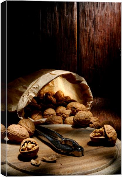 walnuts traditional bag with chopping board Canvas Print by Alessandro Della Torre