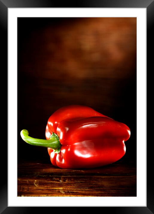 Red Pepper on a wood table Framed Mounted Print by Alessandro Della Torre
