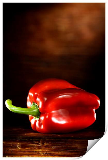 Red Pepper on a wood table Print by Alessandro Della Torre