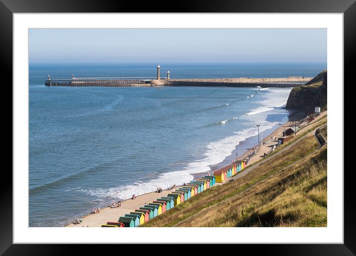 Beach chalets on along Whitby Sands Framed Mounted Print by Jason Wells