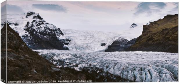 Huge glacier, view of the tongue and its large blocks of ice. Canvas Print by Joaquin Corbalan