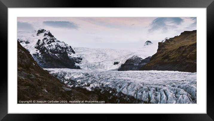 Huge glacier, view of the tongue and its large blocks of ice. Framed Mounted Print by Joaquin Corbalan