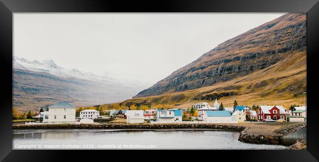Fishing village on the east coast of Iceland Framed Print by Joaquin Corbalan