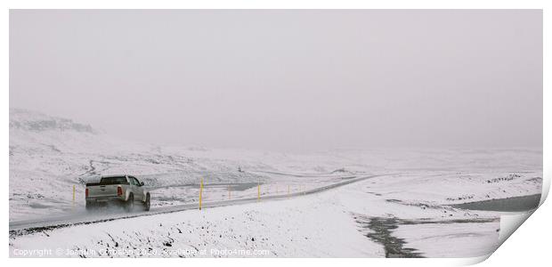 Cars circulating on snowy tracks during a winter storm. Print by Joaquin Corbalan