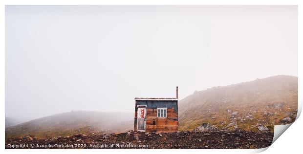 Small wooden hut on top of a mountain surrounded by fog in winter to seek solitude. Print by Joaquin Corbalan