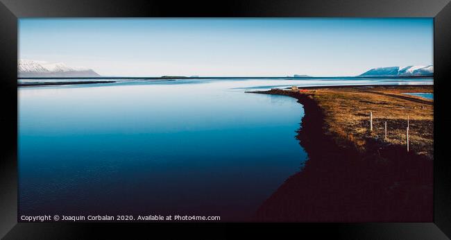 Scene of tranquility and relaxation in a calm sea in nature Framed Print by Joaquin Corbalan