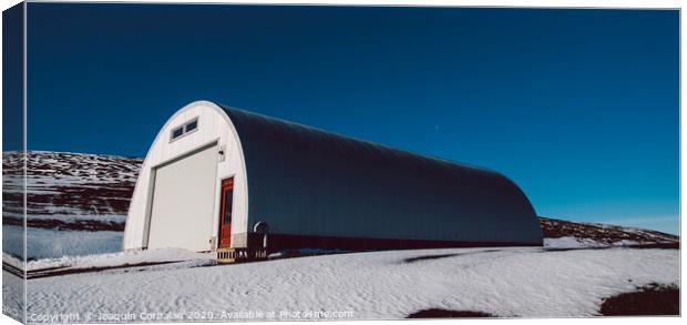 Warehouse road maintenance material on top of a snowy mountain. Canvas Print by Joaquin Corbalan