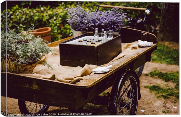 Old wooden cart to transport goods used for decoration at a wedding. Canvas Print by Joaquin Corbalan