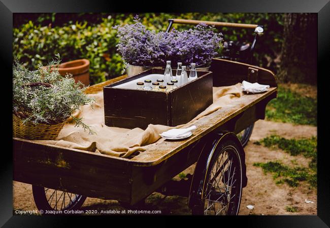 Old wooden cart to transport goods used for decoration at a wedding. Framed Print by Joaquin Corbalan