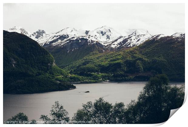 Lake surrounded by high snowy mountains in winter. Print by Joaquin Corbalan