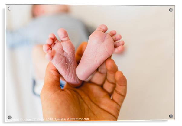 Newborn feet skinning held by mommy Acrylic by Joaquin Corbalan