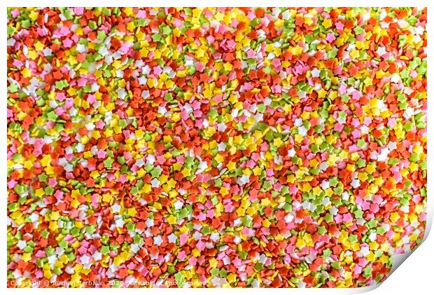 Close-up of colorful little stars made of sugar to decorate desserts, culinary background. Print by Joaquin Corbalan