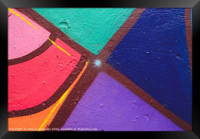 Detail of an anonymous street graffiti with many colors, cheerful urban background. Framed Print by Joaquin Corbalan