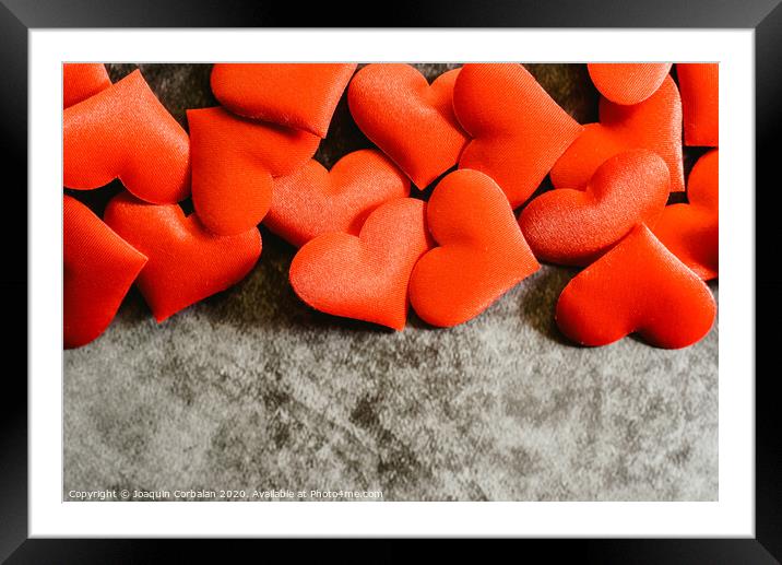Many red hearts isolated to use background on Valentine's Day. Framed Mounted Print by Joaquin Corbalan